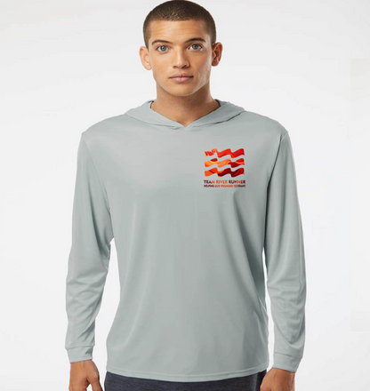 wearing a gray long-sleeve TRR Hells canyon 2025 shirt